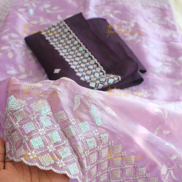 Beautiful leaf design lavender colour organza saree with dark purple blouse piece - Sparkle and Glow