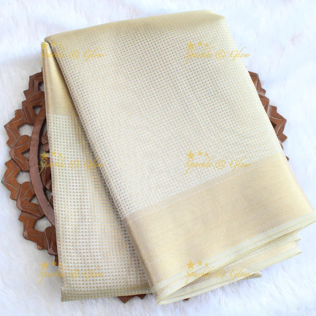 Nayanthara inspired Simple and elegant cream colour banarasi tissue silk saree with blouse piece - Sparkle and Glow
