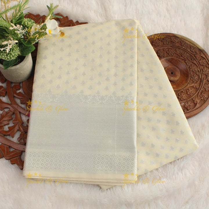 Simple cream colour banarasi tissue silk saree with blouse piece - Sparkle and Glow