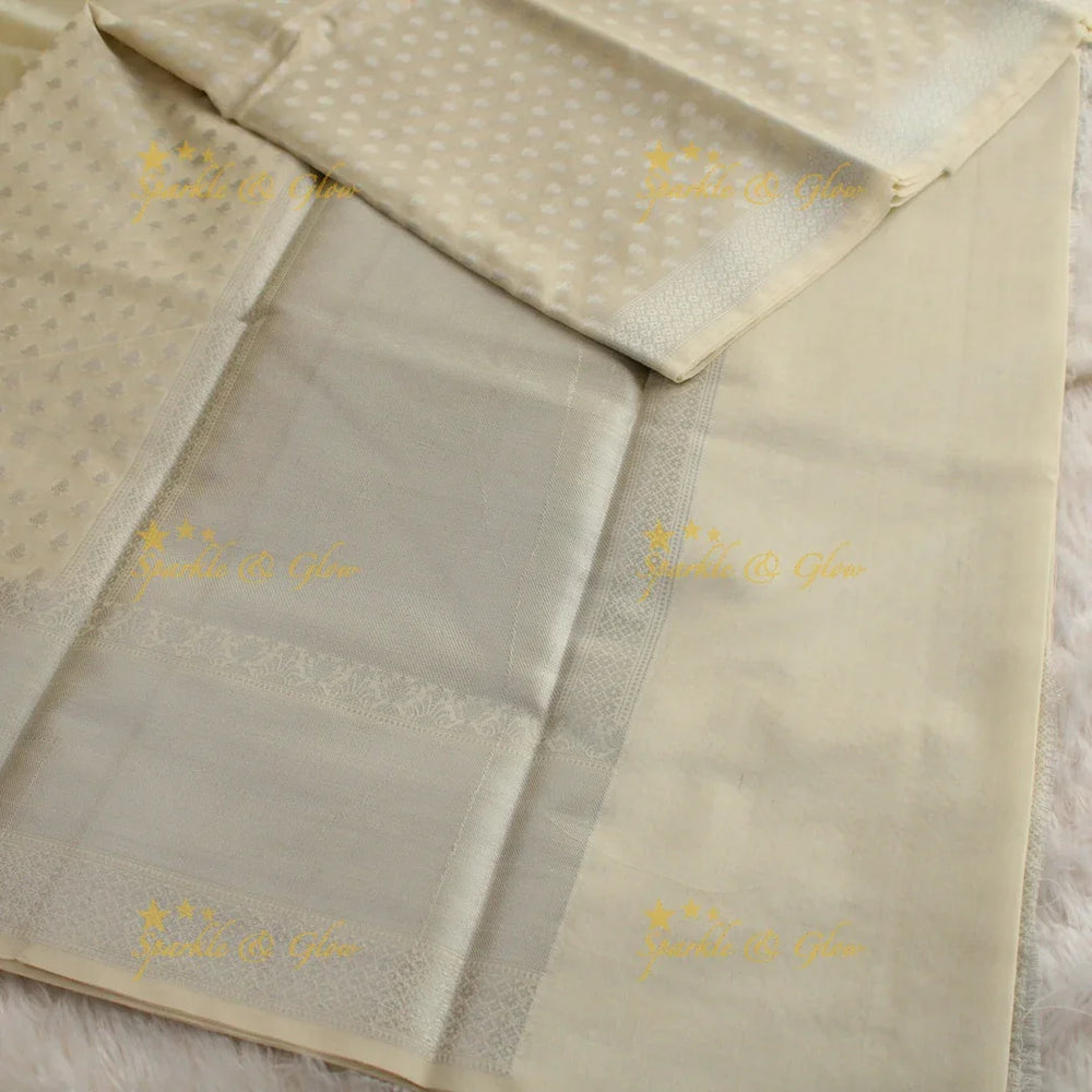 Simple cream colour banarasi tissue silk saree with blouse piece - Sparkle and Glow