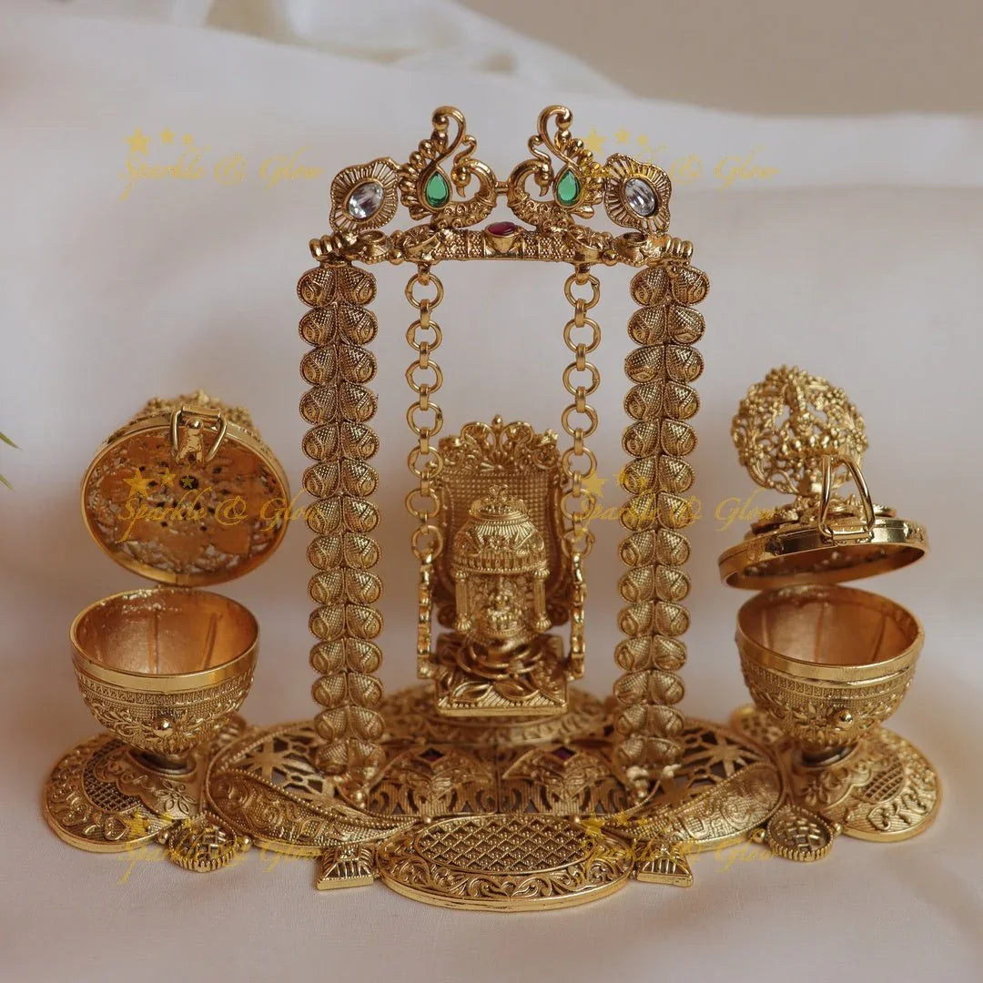 Grand Peacock design Idol Lakshmi on swing Kumkum box - Sparkle and Glow