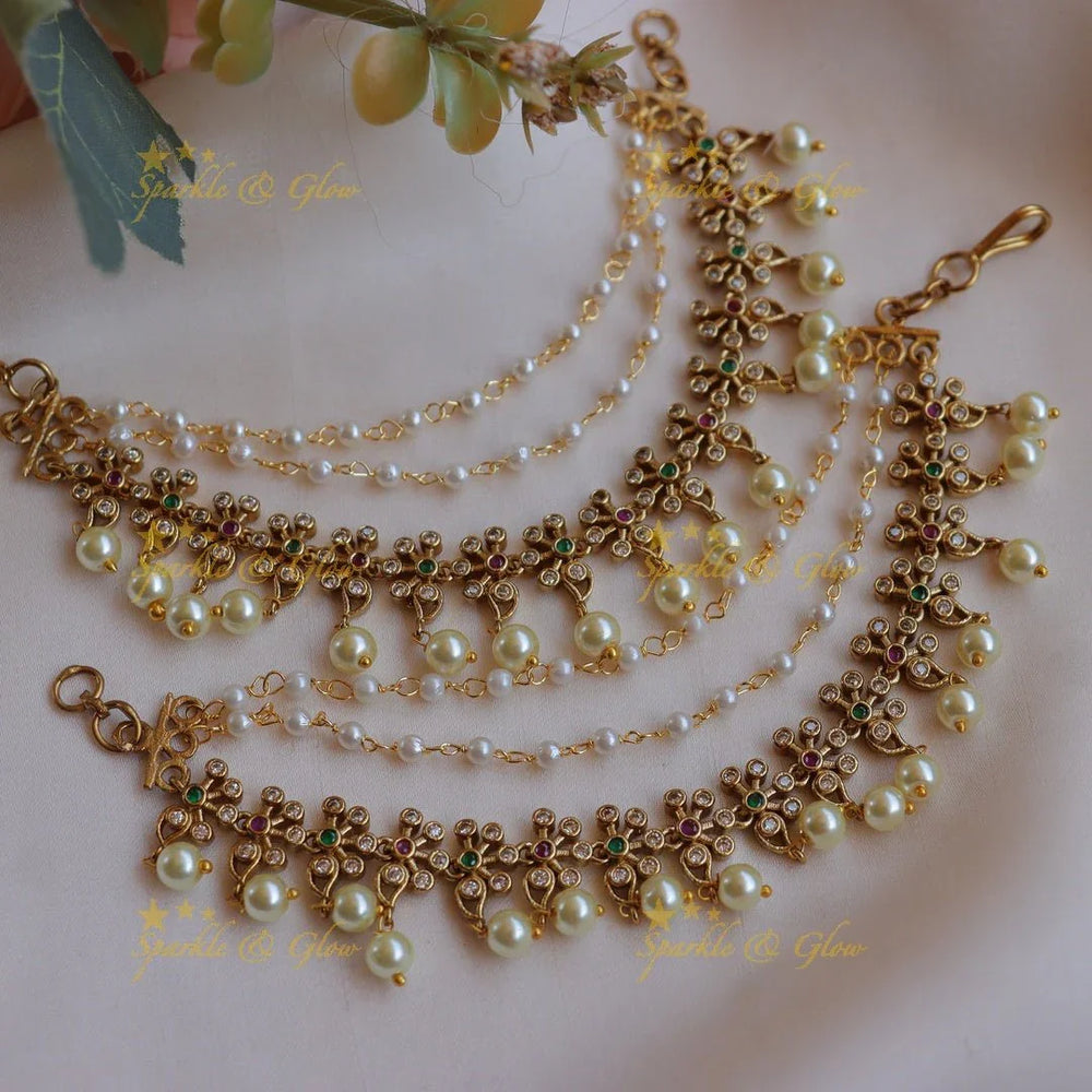 Elegant Flower design Earchain with AD stones and pearls - Sparkle and Glow