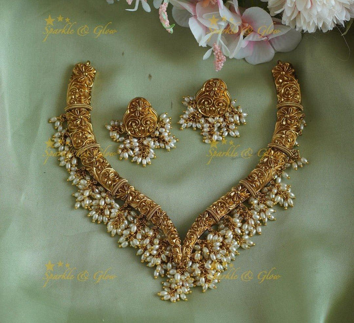 Statement Flower design Hasli short necklace with rice pearls - Sparkle and Glow