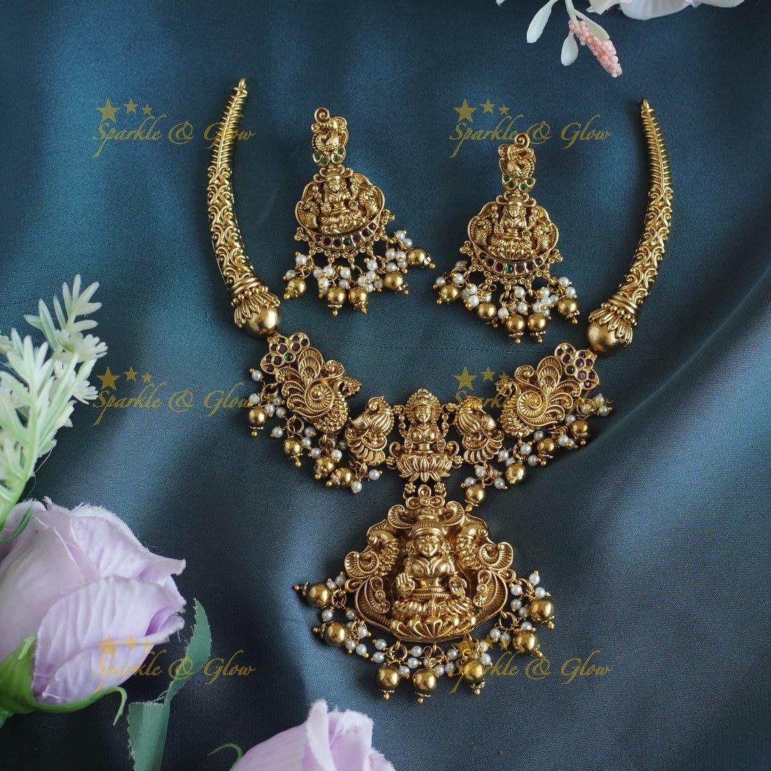 Elegant Idol Lakshmi Peacock carved Hasli short necklace with gold beads - Sparkle and Glow