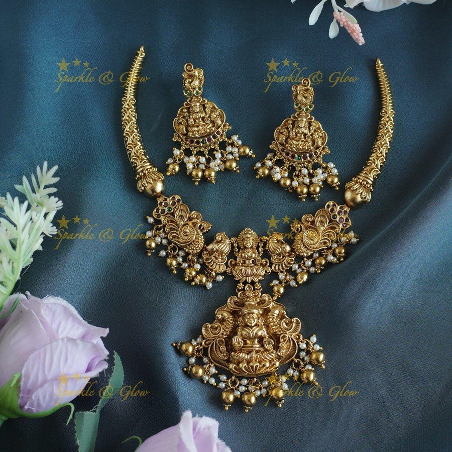 Elegant Idol Lakshmi Peacock carved Hasli short necklace with gold beads - Sparkle and Glow