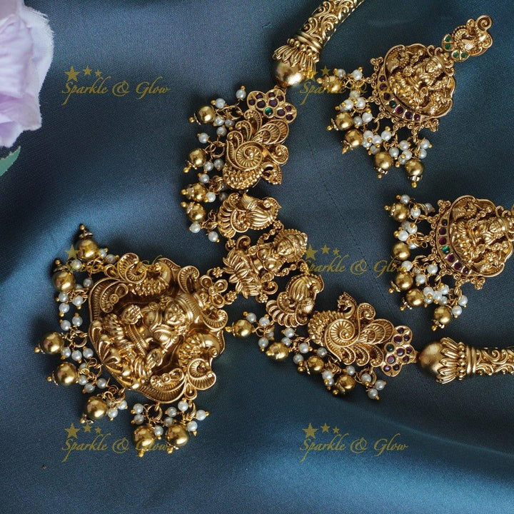 Elegant Idol Lakshmi Peacock carved Hasli short necklace with gold beads - Sparkle and Glow