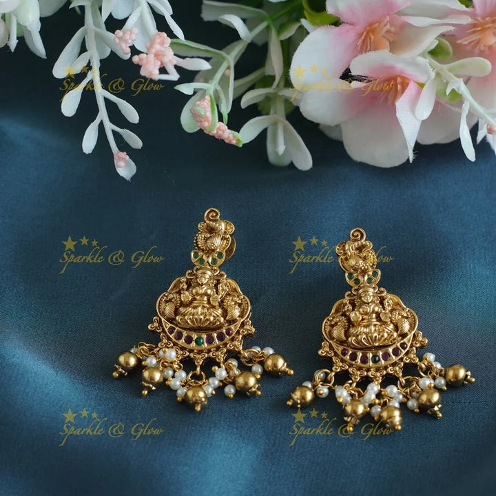 Elegant Idol Lakshmi Peacock carved Hasli short necklace with gold beads - Sparkle and Glow