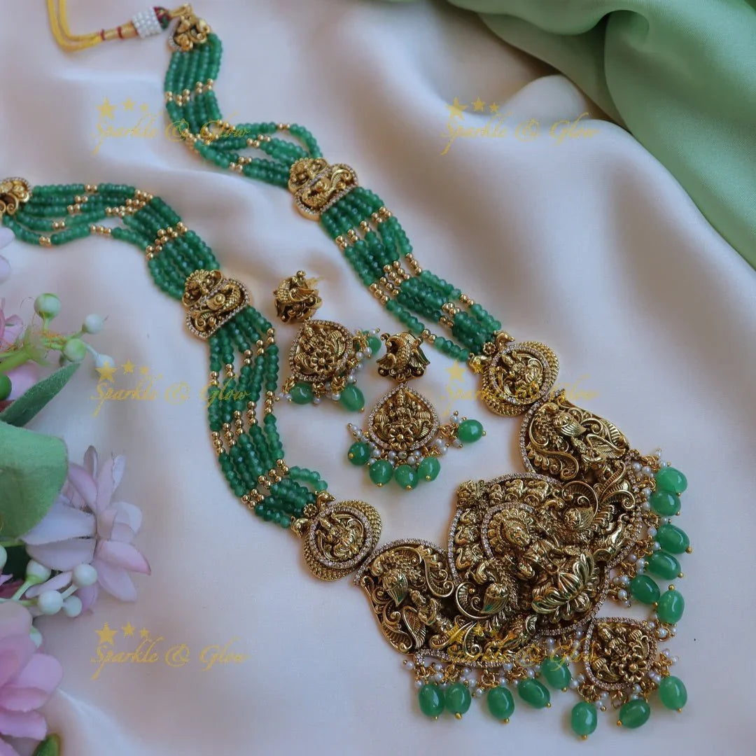 Grand Idol Lakshmi Peacock carved Beaded Haram - Sparkle and Glow