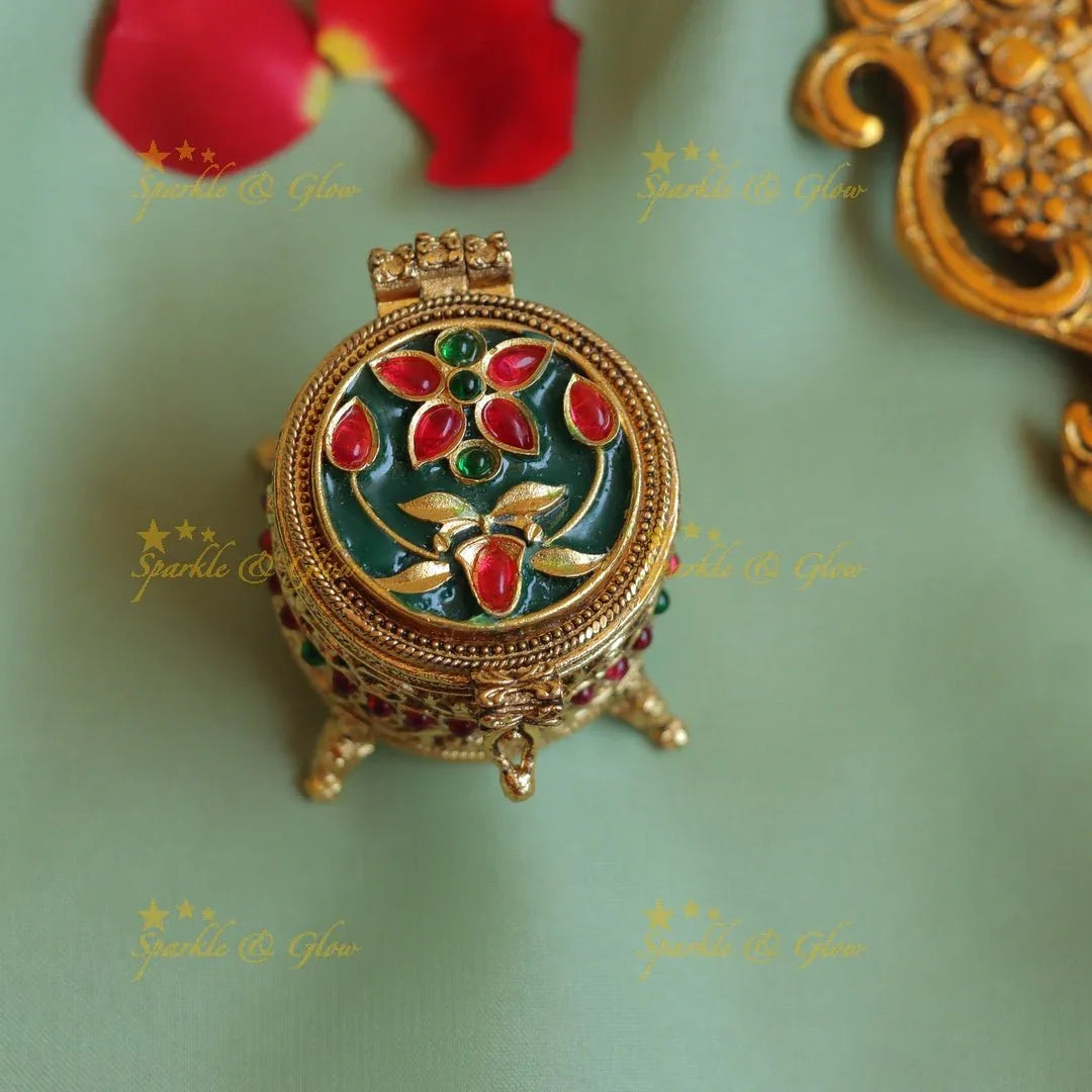 Stunning Oval Kundan Floral carved Kumkum box - Sparkle and Glow