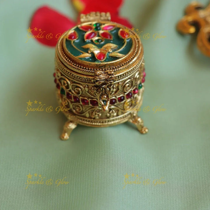 Stunning Oval Kundan Floral carved Kumkum box - Sparkle and Glow