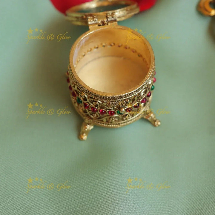 Stunning Oval Kundan Floral carved Kumkum box - Sparkle and Glow