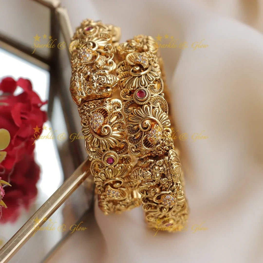 Exquisite Gold-alike Lakshmi Peacock carved temple Bangles - Sparkle and Glow