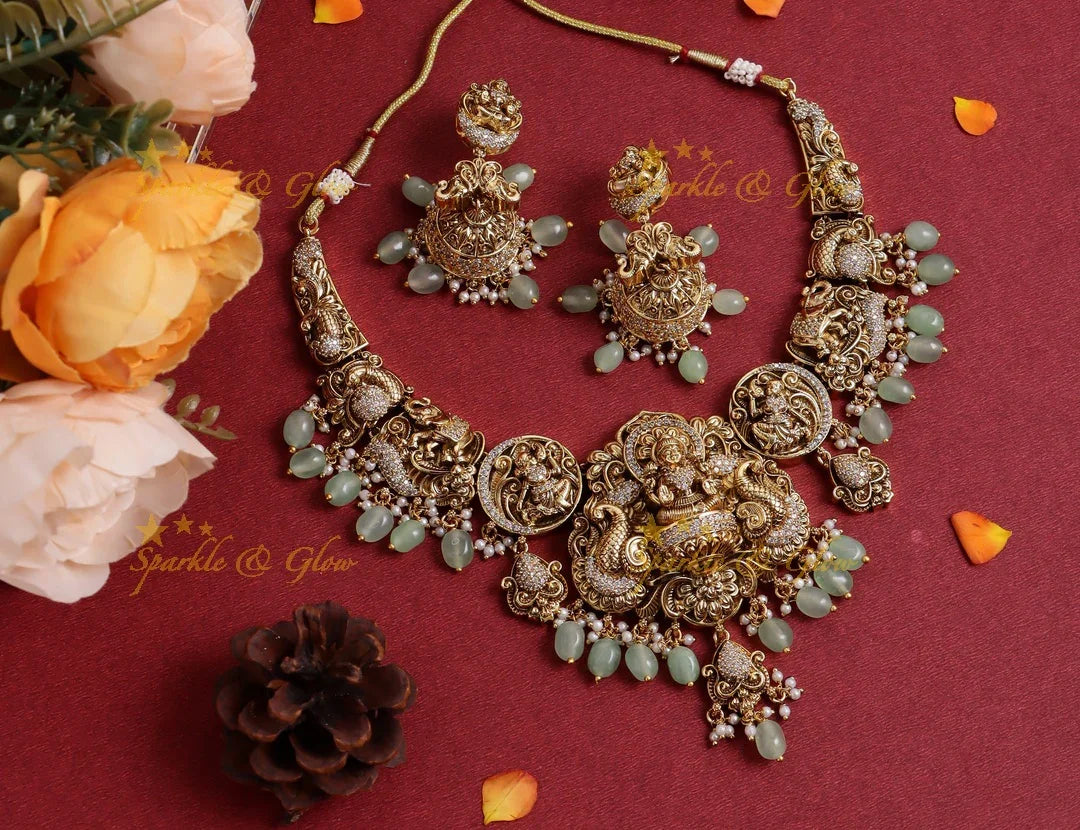 Stunning Gold alike Idol Lakshmi Peacock Elephant carved short necklace - Sparkle and Glow