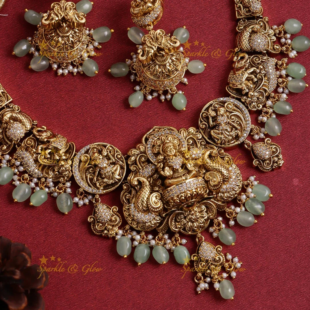 Stunning Gold alike Idol Lakshmi Peacock Elephant carved short necklace - Sparkle and Glow