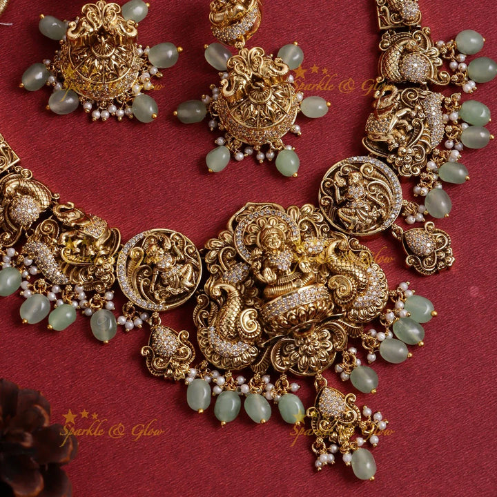 Stunning Gold alike Idol Lakshmi Peacock Elephant carved short necklace - Sparkle and Glow