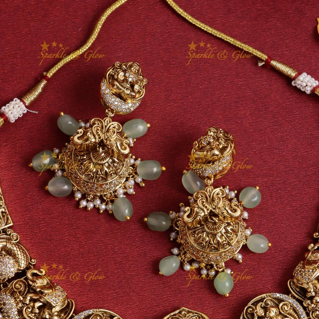 Stunning Gold alike Idol Lakshmi Peacock Elephant carved short necklace - Sparkle and Glow