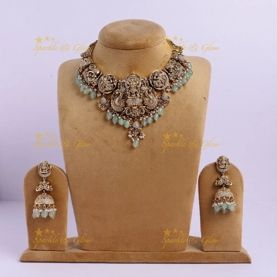 Stunning Gold alike Idol Lakshmi Peacock Elephant carved short necklace - Sparkle and Glow