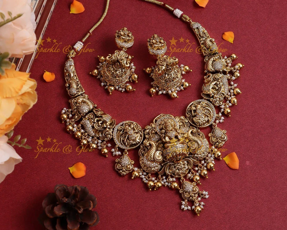 Stunning Gold alike Idol Lakshmi Peacock Elephant carved short necklace - Sparkle and Glow