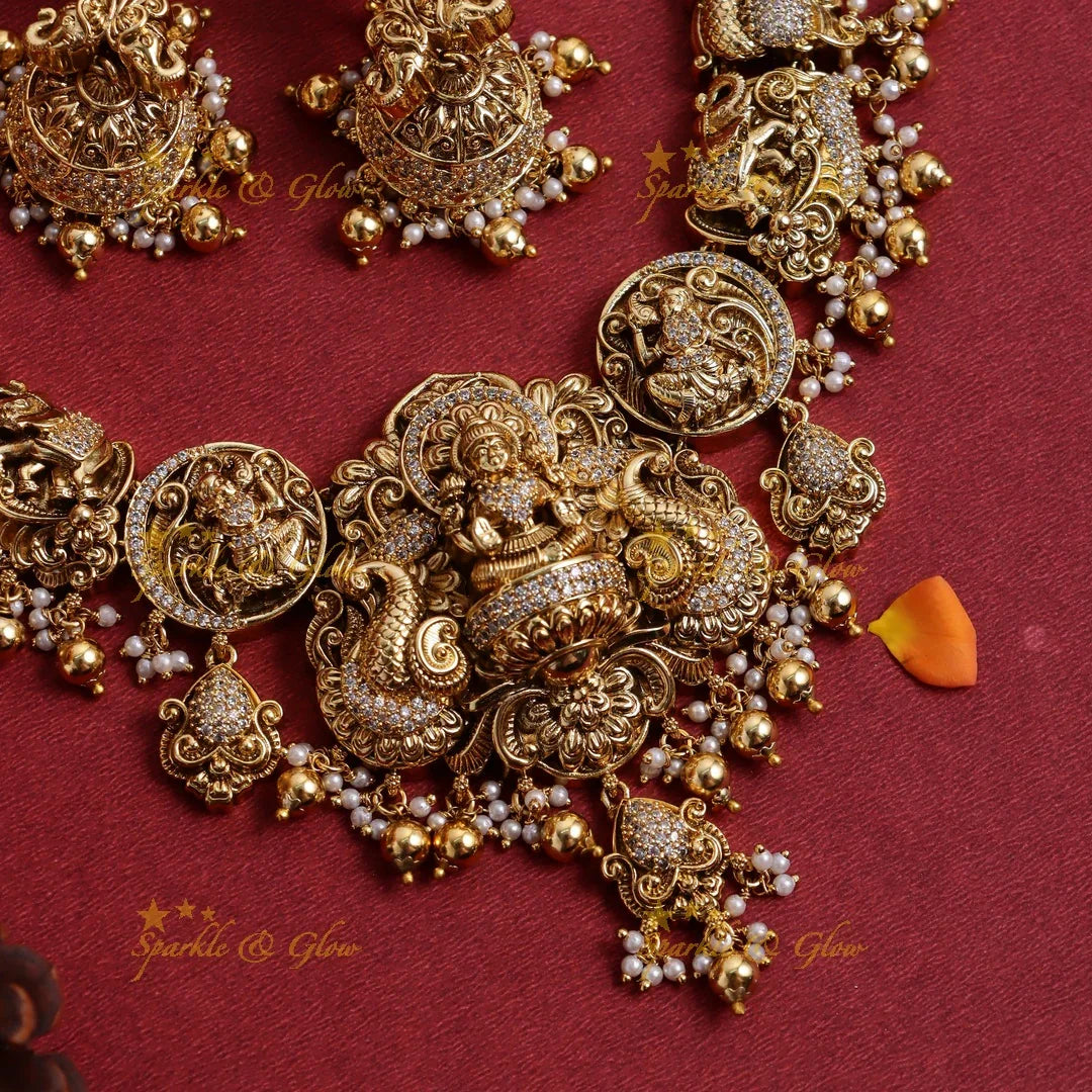 Stunning Gold alike Idol Lakshmi Peacock Elephant carved short necklace - Sparkle and Glow