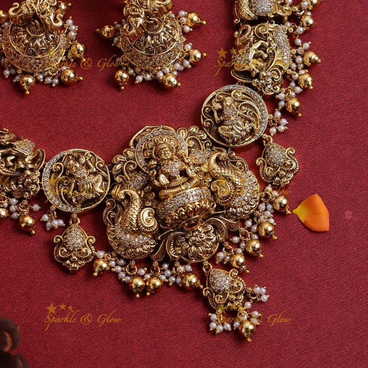 Stunning Gold alike Idol Lakshmi Peacock Elephant carved short necklace - Sparkle and Glow