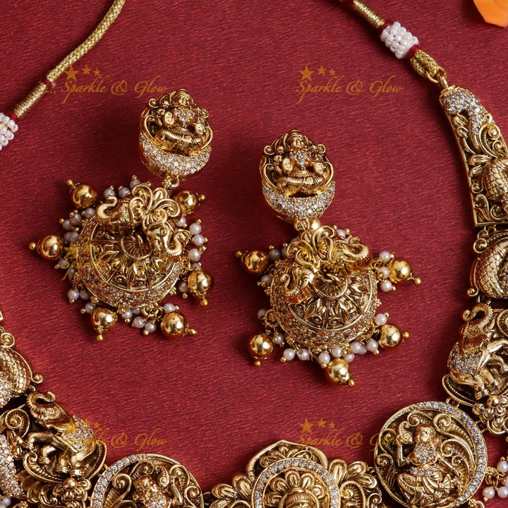 Stunning Gold alike Idol Lakshmi Peacock Elephant carved short necklace - Sparkle and Glow