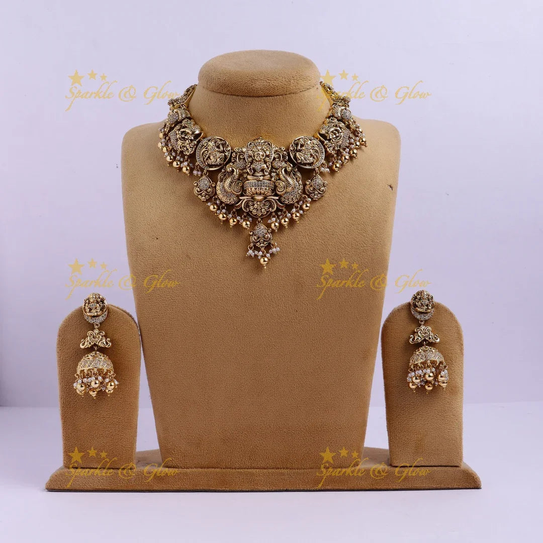Stunning Gold alike Idol Lakshmi Peacock Elephant carved short necklace - Sparkle and Glow