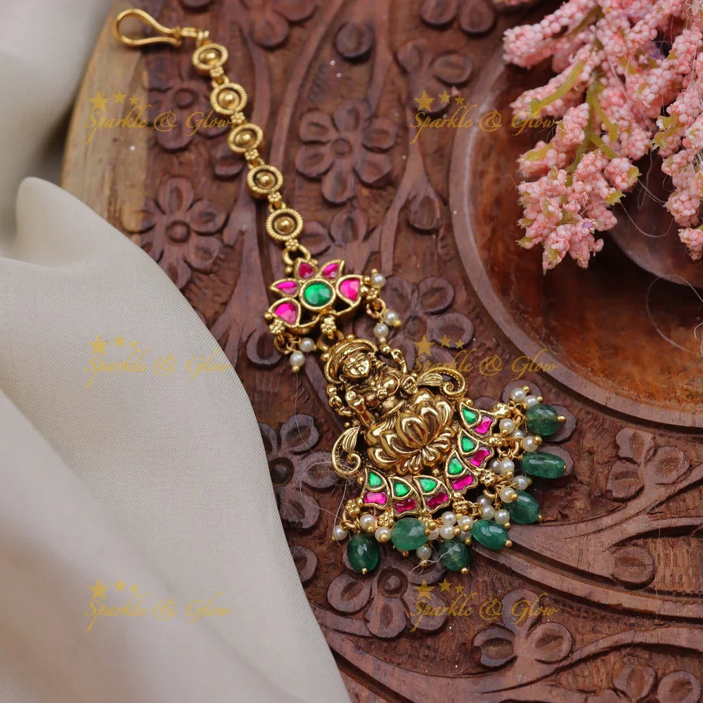 Stunning Jadau Kundan Temple Maang Tikka with Lakshmi Pendant & Enamel Lotus Design - Sparkle and Glow