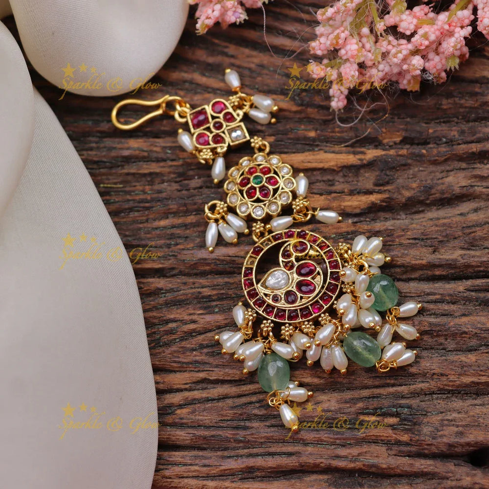 Stunning Jadau Kundan Traditional Peacock Maang Tikka with rice pearls and green beads - Sparkle and Glow