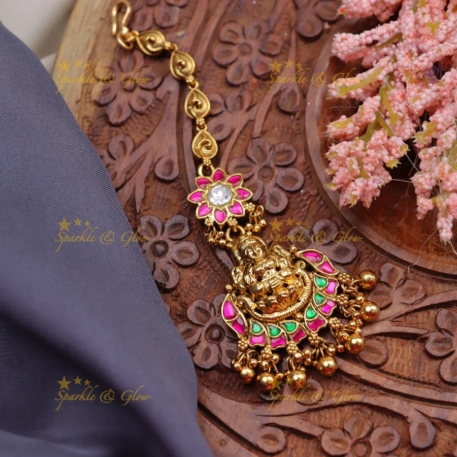 Stunning Jadau Temple Maang Tikka with Lakshmi Pendant & Pink-Green Enamel Work - Sparkle and Glow