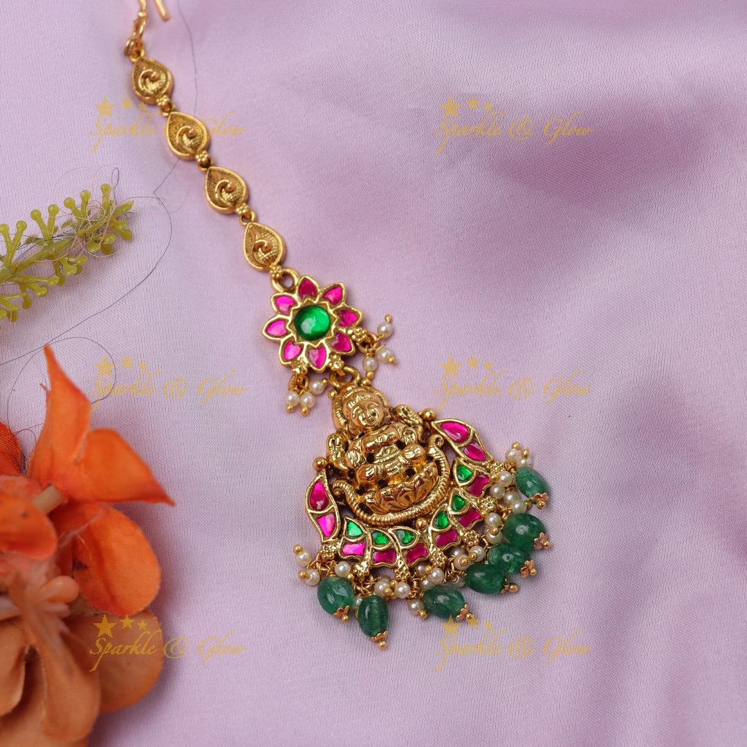 Stunning Jadau Temple Maang Tikka with Lakshmi Pendant & Pink-Green Enamel Work - Sparkle and Glow