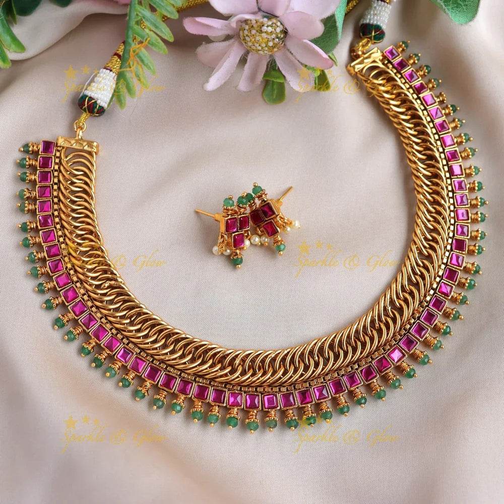 Stunning Jadau Jalebi design Emerald Short necklace - Sparkle and Glow