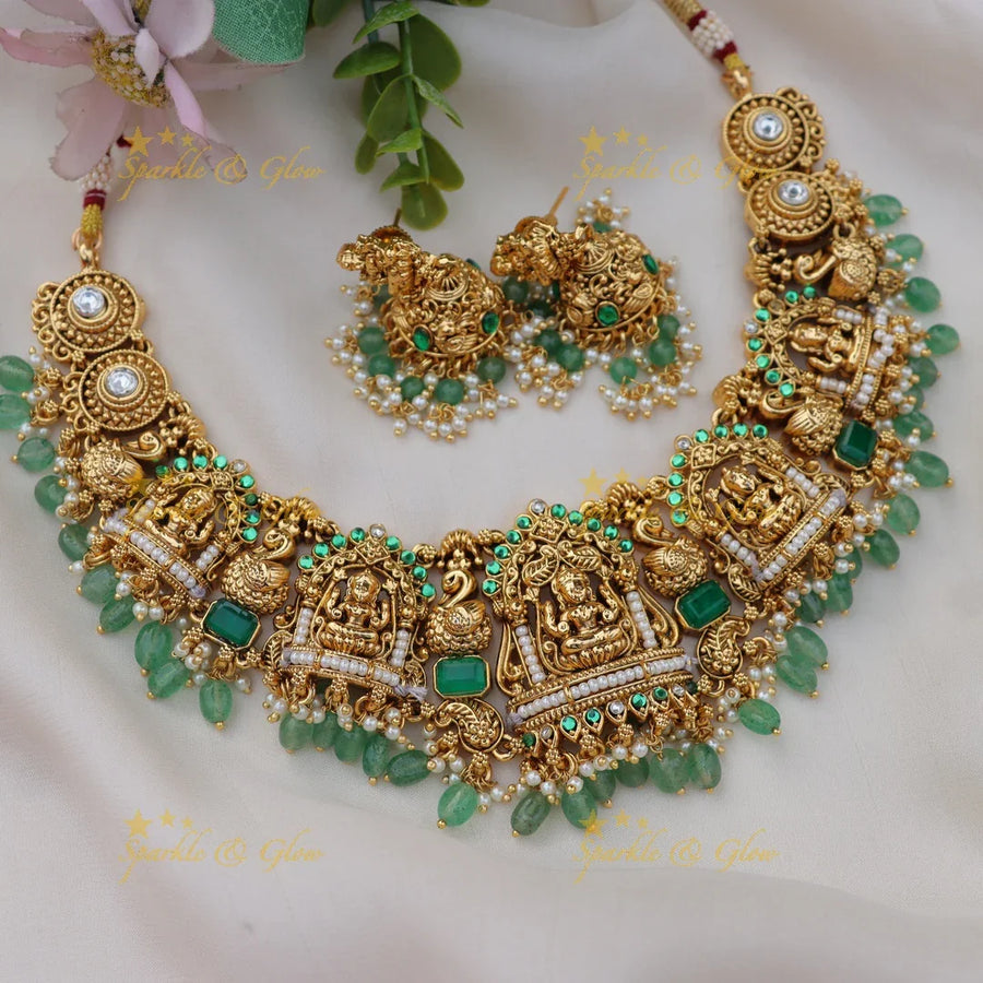 Stunning Jadau Kundan Idol Lakshmi Peacock Short Necklace Set with Green Beads - Sparkle and Glow