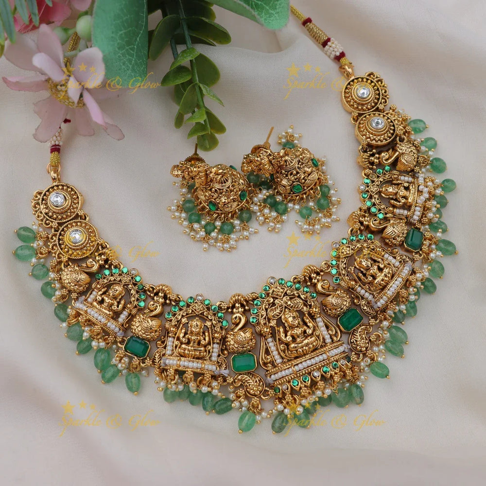 Stunning Jadau Kundan Idol Lakshmi Peacock Short Necklace Set with Green Beads - Sparkle and Glow