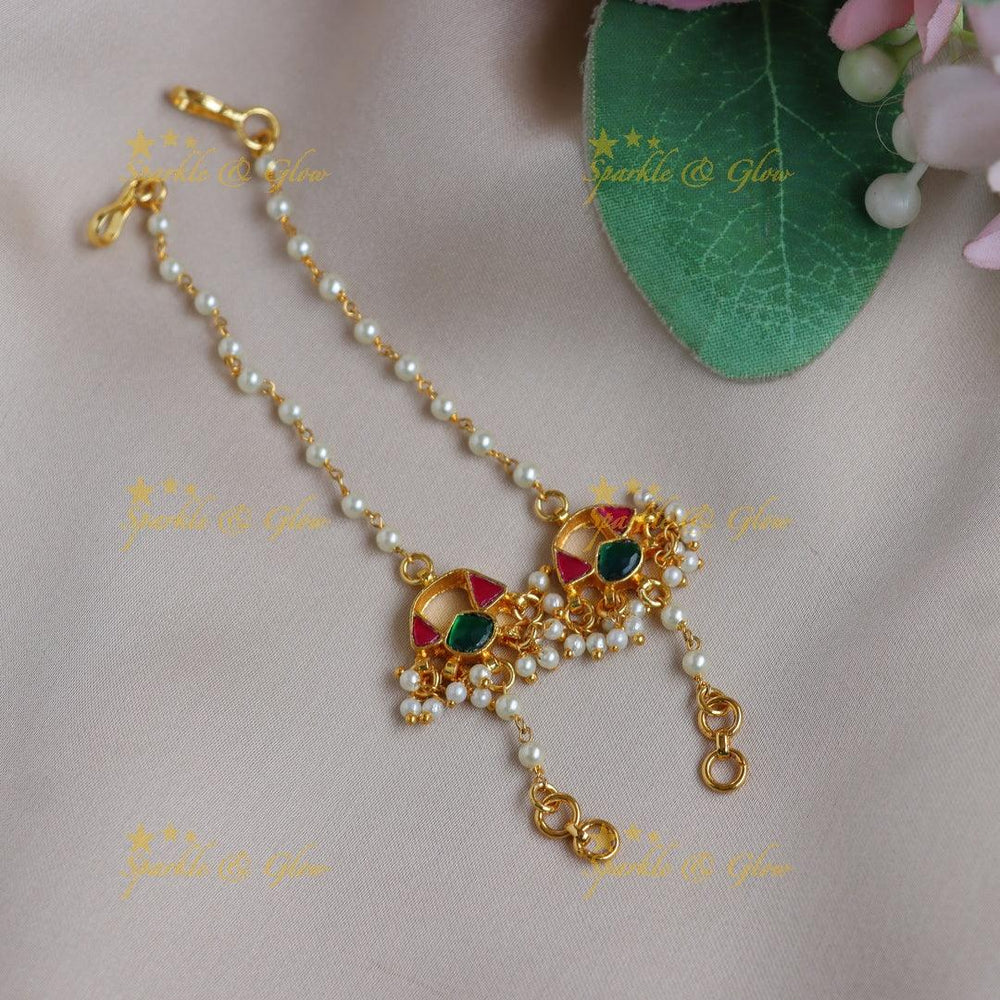 Beautiful Jadau Kundan Pearl Ear Chain with Red Stone Accent - Sparkle and Glow