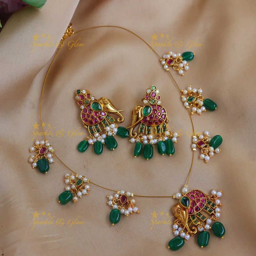 Stunning Elephant Motif Kemp invisible Necklace Set with Green Beads - Sparkle and Glow