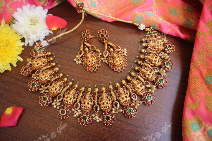 Gold alike polished lakshmi necklace with flower studs made in real kemp stones - Sparkle and Glow