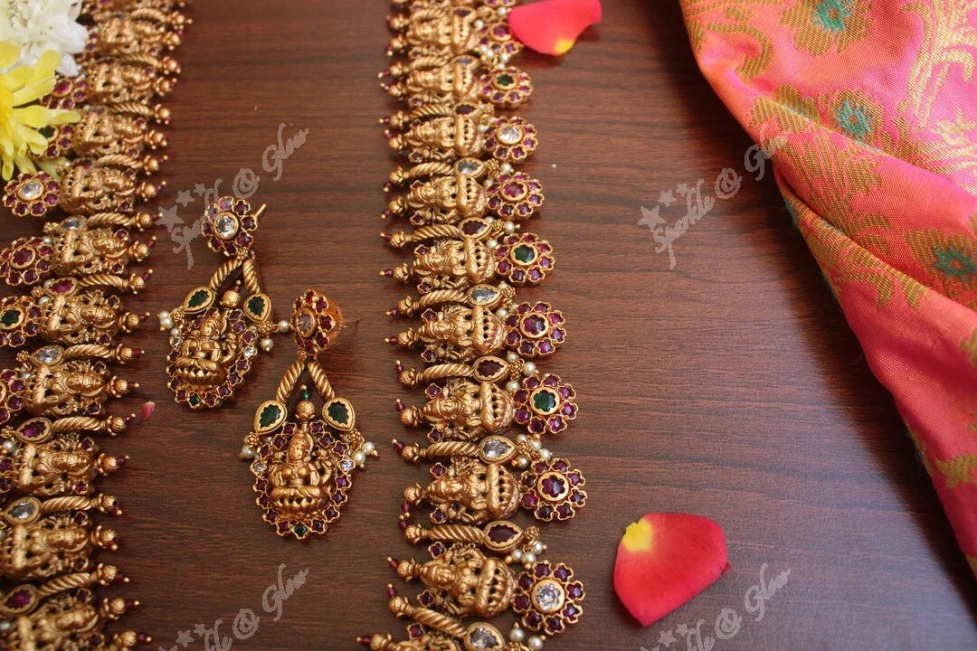 Gold alike polished lakshmi long necklace with flower studs made in real kemp stones - Sparkle and Glow