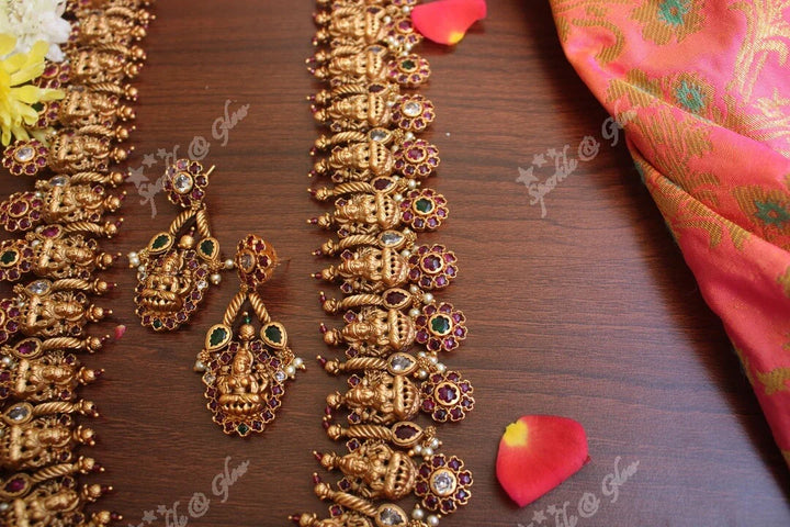 Gold alike polished lakshmi long necklace with flower studs made in real kemp stones - Sparkle and Glow