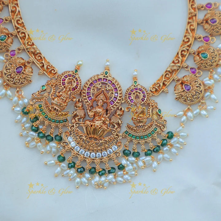 Gracious Lakshmi Kanti Hasli Temple Necklace Set with Jhumkas and Pearl Drops - Sparkle and Glow