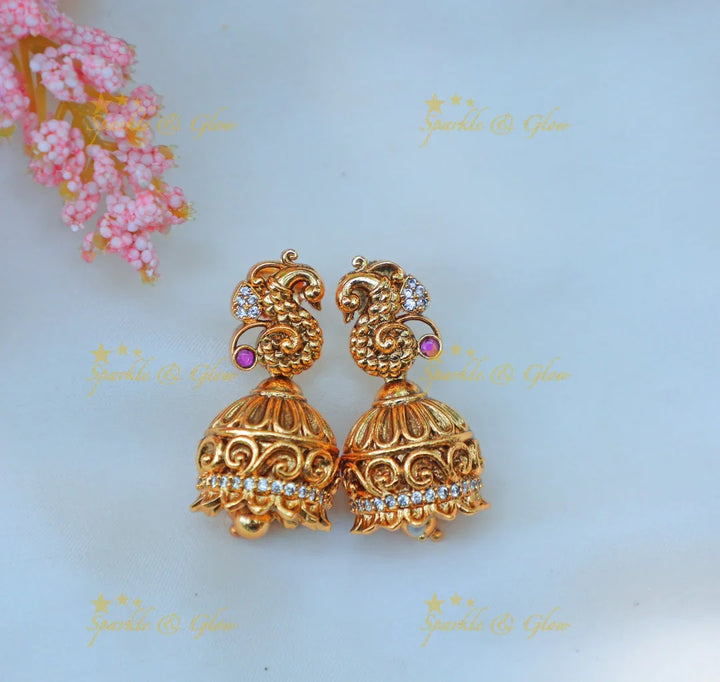 Beautiful Antique Gold alike Temple Hasli Kanti Necklace Set with Lakshmi Pendant & Peacock Motifs - Sparkle and Glow