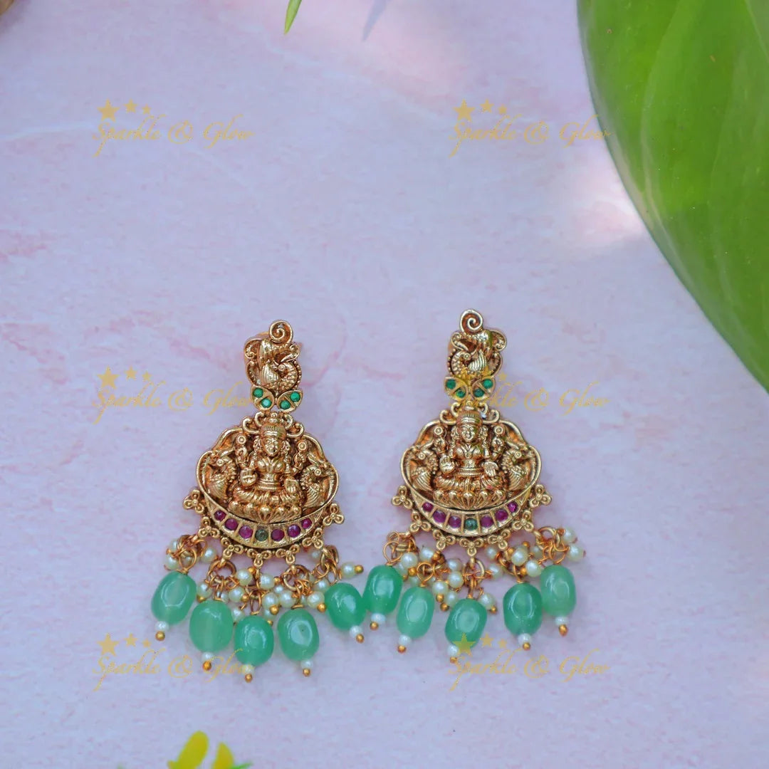 Elegant Idol Lakshmi Peacock carved Hasli short necklace with gold beads - Sparkle and Glow