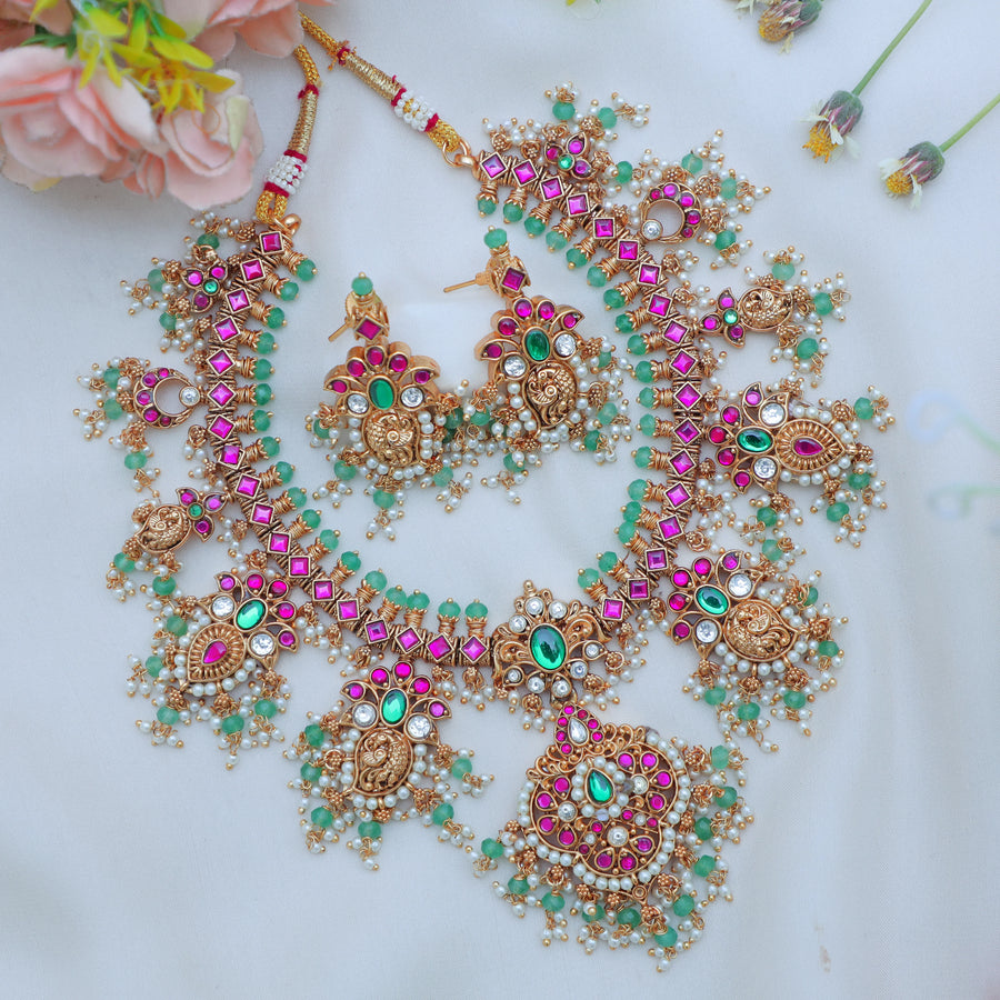 Stunning Jadau Kundan Antique Peacock Motif Necklace Set with Green Beads - Sparkle and Glow