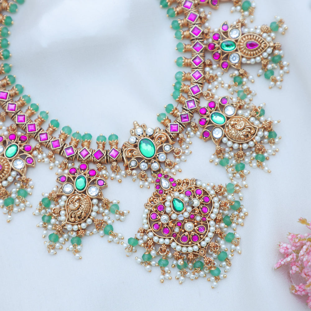 Stunning Jadau Kundan Antique Peacock Motif Necklace Set with Green Beads - Sparkle and Glow