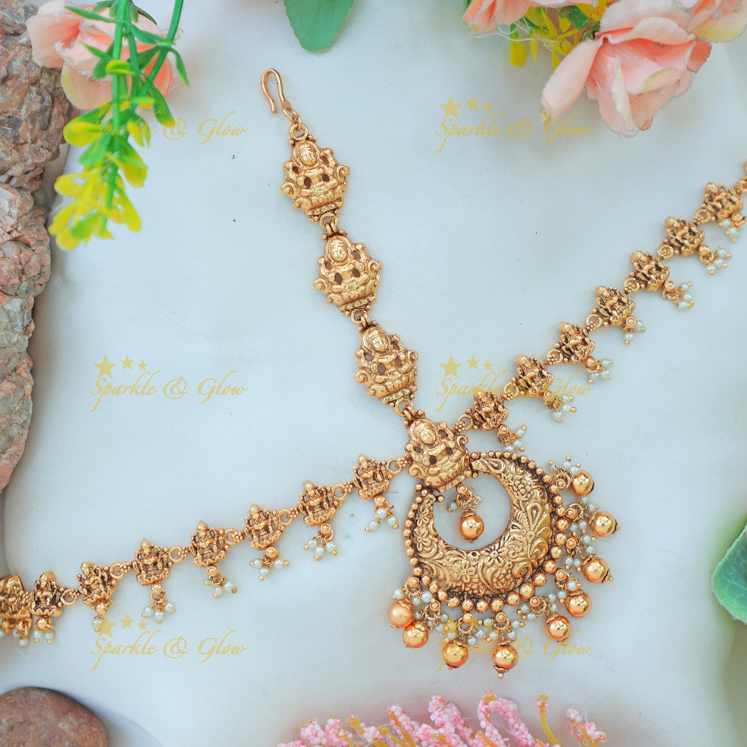 Beautiful Antique Gold alike Maang Tikka with Lakshmi Motifs and Crescent Pendant