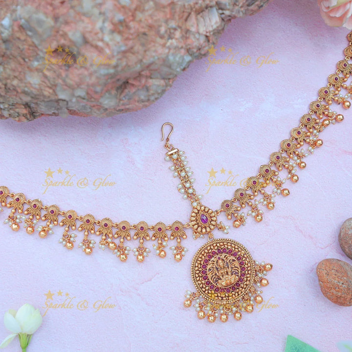 Stunning Temple Style Maang Tikka with Lakshmi Pendant and Pink Kundan Accents - Sparkle and Glow