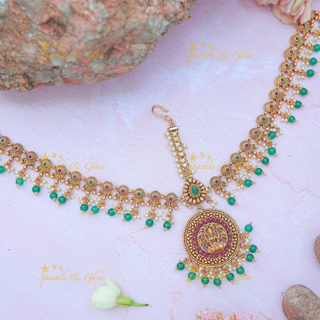 Stunning Temple Style Maang Tikka with Lakshmi Pendant and Pink Kundan Accents - Sparkle and Glow