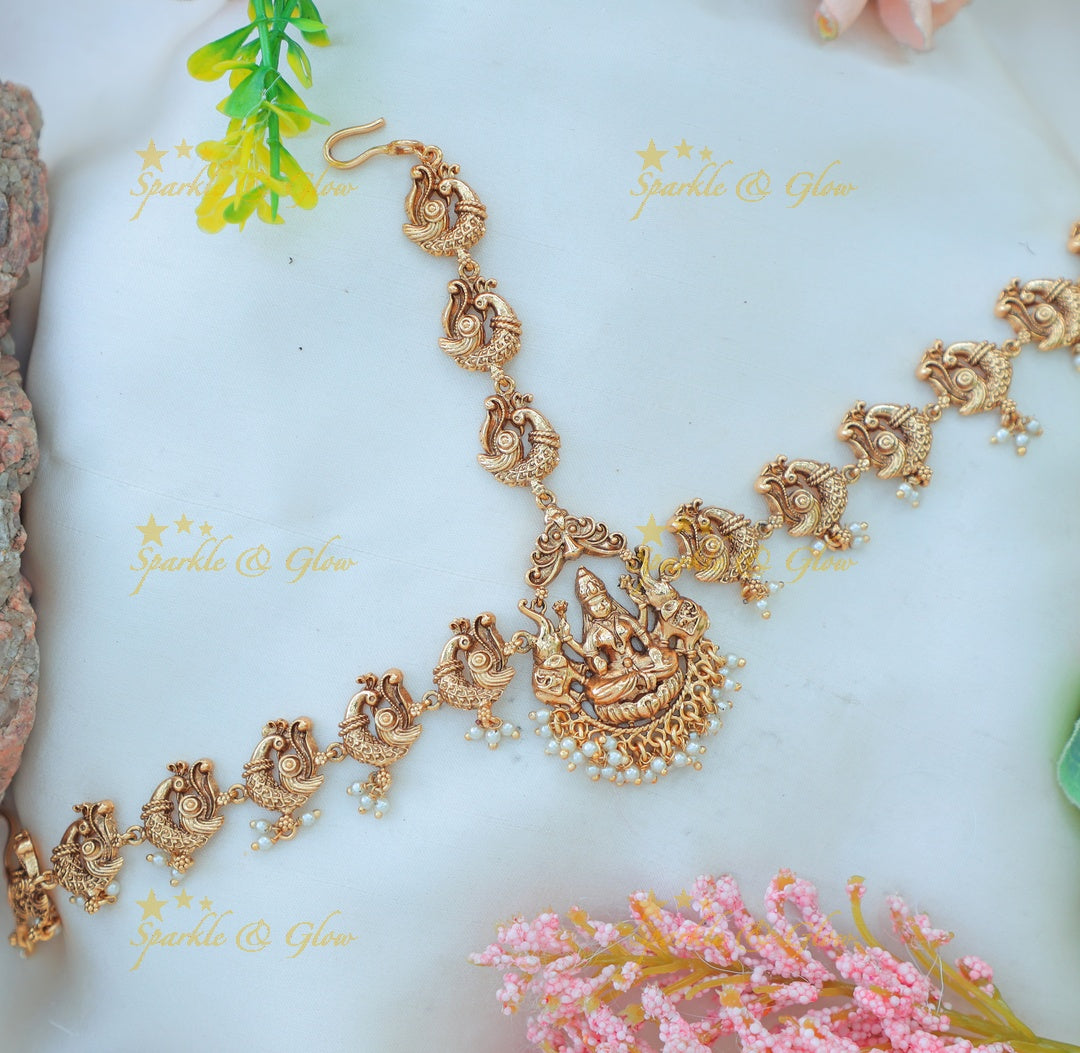 Elegant Antique Gold alike Maang Tikka with Lakshmi Pendant & Peacock Motif