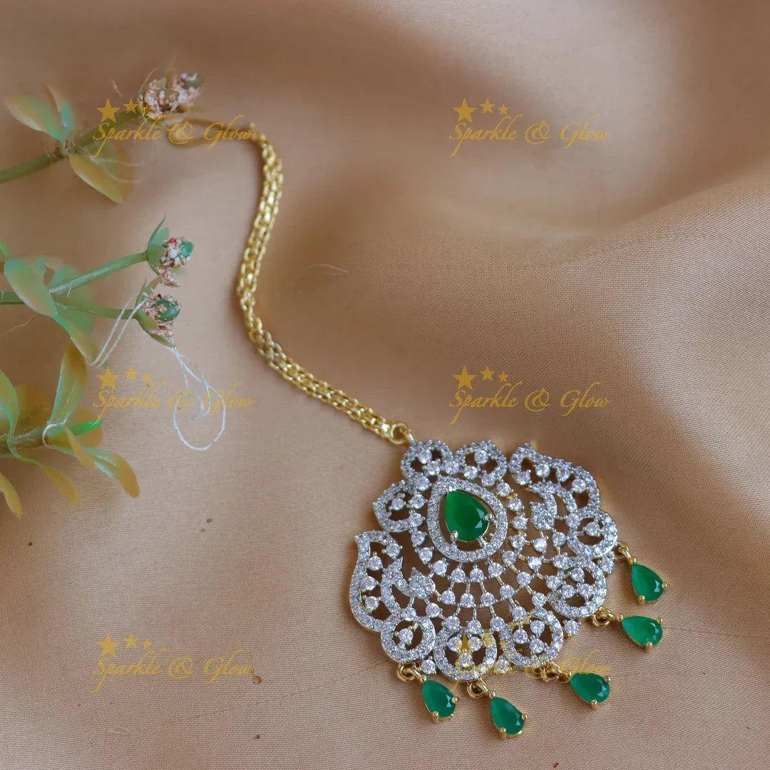 Elegant GJ polish Floral Mango carved AD Maang tikka with Teardrop Accents - Sparkle and Glow