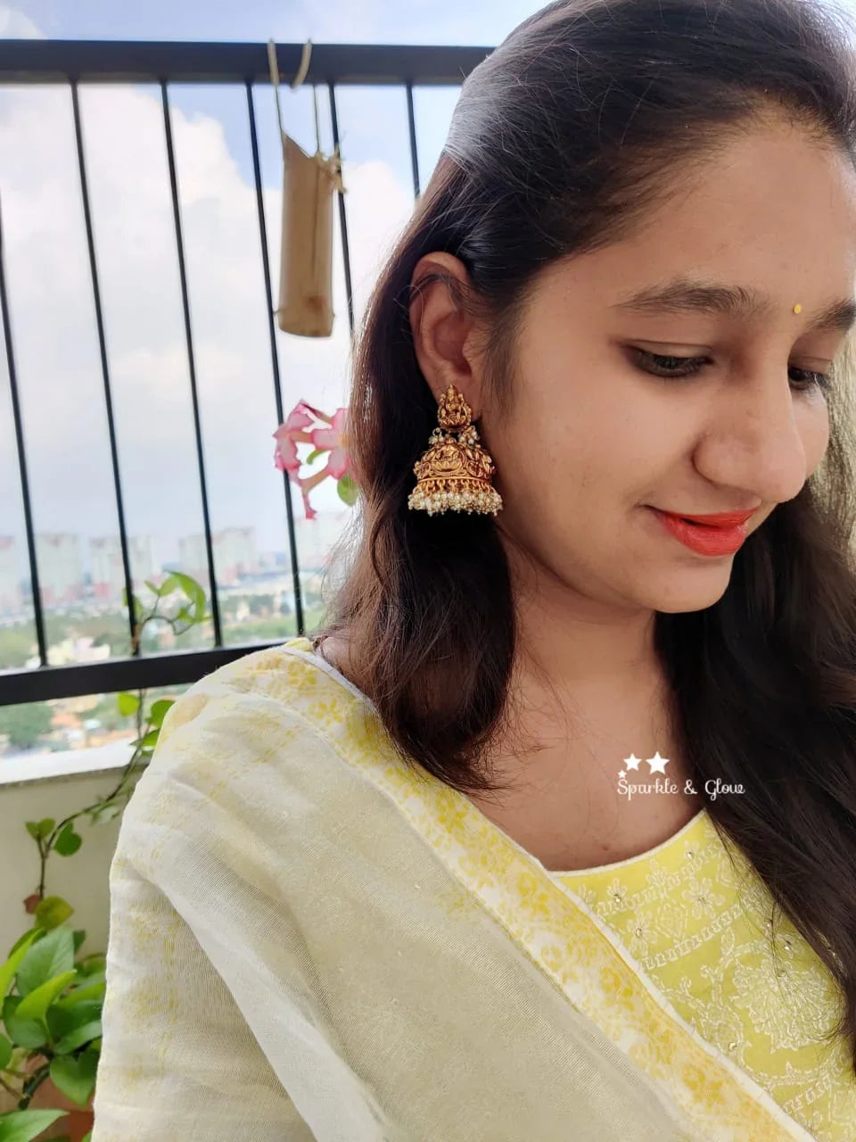 Intricately carved lakshmi jhumakas - Sparkle and Glow