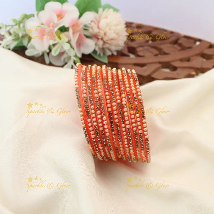 Elegant Glass Bangles with Pearl & Stone Embellishments – Set of 12